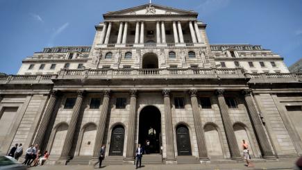 Bank of England holds, sterling turns lower