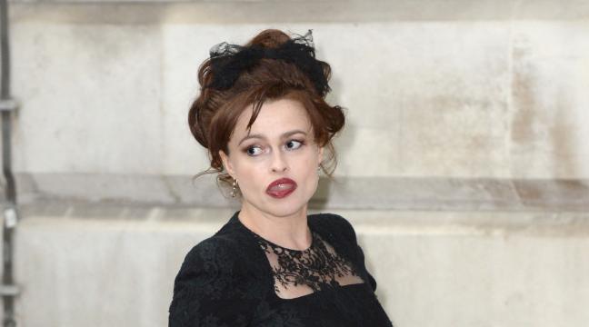 Helena Bonham Carter covers up after posing naked with a 