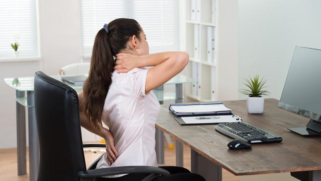 Image result for back pain sitting at desk"