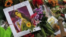 Tributes to singer Amy Winehouse outside her North London home.