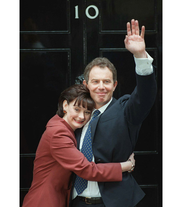 Tony Blair is hugged by wife Cherie outside No.10 Downing Street.